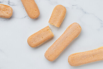 Italian cookie savoiardi. Sweet biscuits. Sponge cookies tiramisu on white background