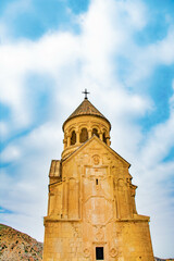Fototapeta na wymiar Beautiful architecture of Armenian ancient churches. Noravank monastery and blue sky