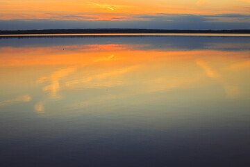 Reflection of a beautiful sunset over the water
