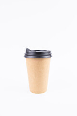 a paper cup for coffee with a lid and a straw on a white background
