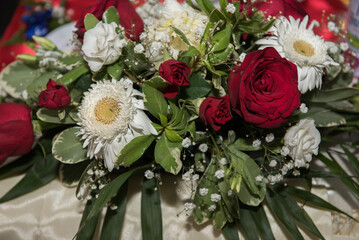 the bride's car decorated with a bouquet of flowers, in Romania