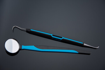 Dentist tools :Dental mirror and probe, periodontal scaler