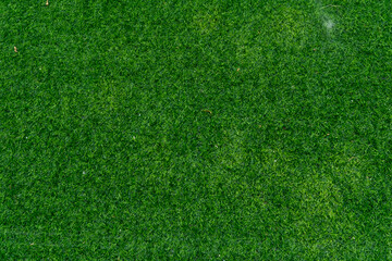 Top view artificial grass  field background texture, shot from above. abstract background.