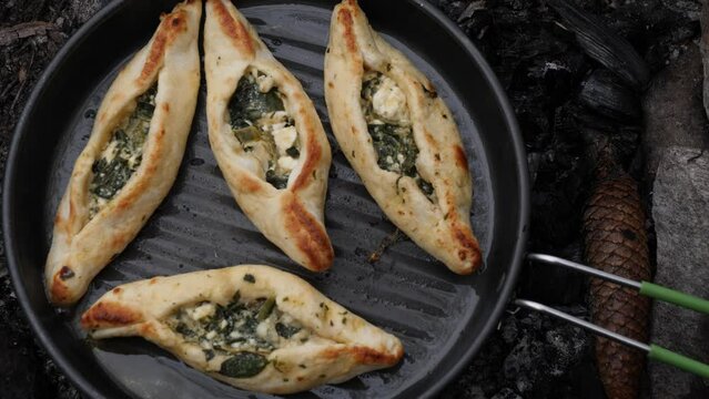 Turkish Pide in Frying Pan, Type of Flatbread Pizza, Outdoor Cooking Concept, Close Up