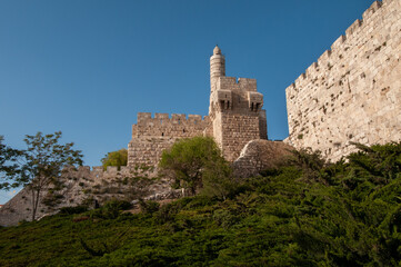 View of the landmark, stone Tower of David and the surrounding walls and greenery of the Old City of Jerusalem. © Yehoshua Halevi
