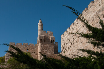 View of the landmark, stone Tower of David and the surrounding walls and greenery of the Old City of Jerusalem. © Yehoshua Halevi
