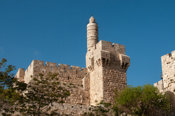View of the landmark, stone Tower of David and the surrounding walls and greenery of the Old City of Jerusalem. © Yehoshua Halevi