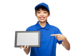 profession, job and people concept - happy smiling delivery woman in blue uniform with tablet pc computer over white background