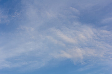 white fluffy clouds in the blue sky, nature background