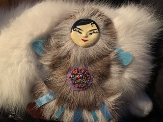 Beautiful nature in the Yamal-Nenets Autonomous Republic. Traditional doll of the community. Handmade toy made of fabric and beads.
Children's toy in remote regions of Siberia.