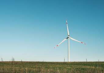 lone wind turbine in field
