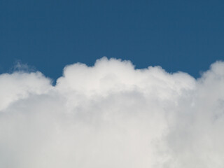 big puffy cloud in sky, closeup