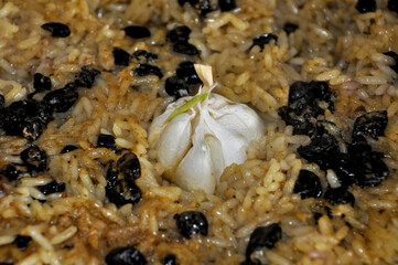 a private trader cooks in Uzbek pilaf