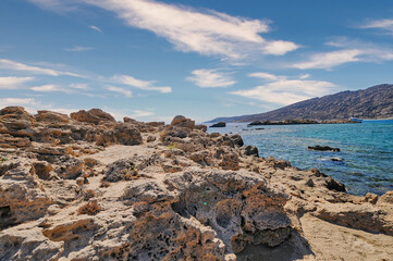 Fototapeta na wymiar Rocks in Manganari beach in Ios island