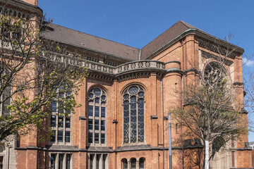 Fototapeta na wymiar Protestant St John's Church (Johanneskirche, 88 m high tower) in the square of Martin-Luther. Church built from 1875 to 1881 in Romanesque Revival style. DUSSELDORF, GERMANY.