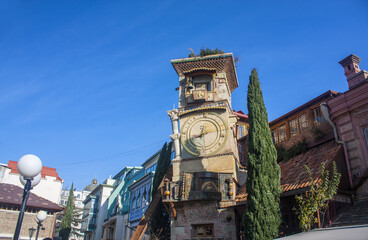 Fairy tale Clock Tower of puppet theater Rezo Gabriadze in the old town of Tbilisi, Georgia