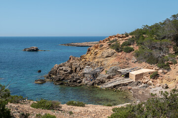 Calo de S Illa beach on the Island of Ibiza in Spain in the summer of 2022