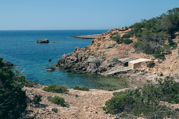 Fototapeta na wymiar Calo de S Illa beach on the Island of Ibiza in Spain in the summer of 2022