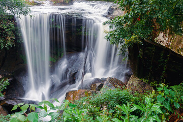 Penpobmai Waterfall - Phu Kradueng National Park. It is a sandstone mountain peak cut. It has a high point of 1,316 m. The mountain’s steep sides are home of tropical forest.