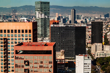 Panoramic view of Mexico City. Downtown district skyline with huge skyscrapers, glass towers in the city center of the Central American capital, CDMX, México.