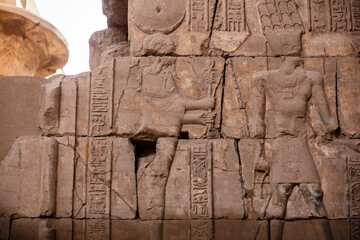 Different hieroglyphs on the walls and columns in the Karnak temple. Karnak temple is the largest...