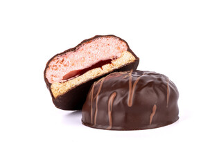 Closeup sweet dessert souffle in chocolate with pink filling.