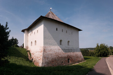 Fototapeta premium View of Spasskaya tower (1239, the symbol of the town) on sunny summer day. Vyazma, Smolensk Oblast, Russia.