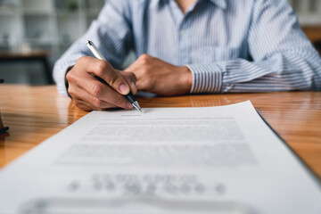 Lawyer or judge holding Hammer prepares to judge the case with justice, and litigation, scales of justice, law hammer,  Legal consulting services, Concept of litigation, and legal services.