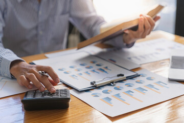 Business analyst team checking in financial statement for audit internal control system. Accounting...