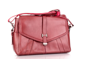 One handbag made of artificial leather, close-up, isolated on a white background.