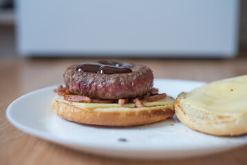 Handmade hamburger with french fries and dips made at home