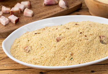 Farofa, typical brazilian manioc flour side dish with seasonings