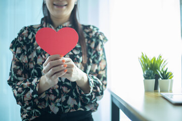 woman holding red heart  health insurance  donation  happy charity volunteer concept  world heart...