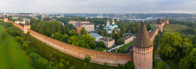Panoramic aerial view of Kremlin towers and walls on summer sunrise. Smolensk, Russia..