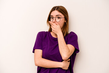 Young caucasian woman isolated on white background scared and afraid.