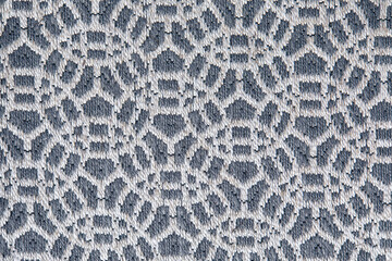 Abstract circular print background on cotton fabric in gray tone