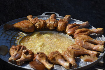 crispy chicken thighs  and fried potatoes