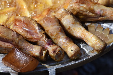 crispy chicken thighs  and fried potatoes
