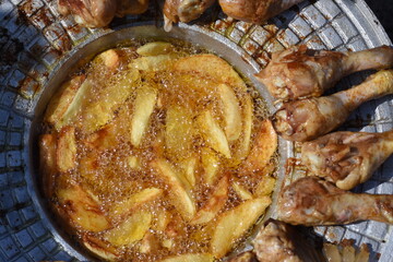 crispy chicken and fried potatoes