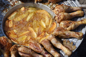 crispy chicken and fried potatoes