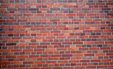 Red color pattern of brick wall.