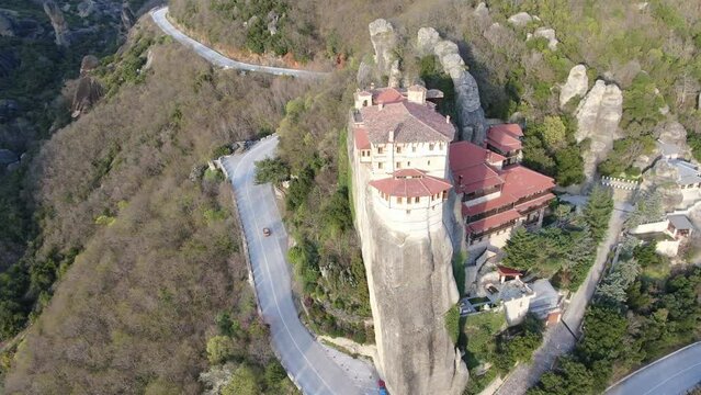 4k cinematic aerial video of medieval monasteries on top of impressive rock formations at Meteora, Greece