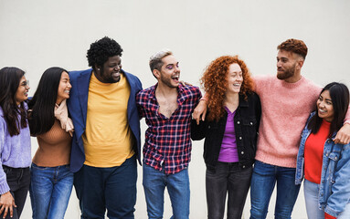 Group of happy multiracial people having fun together in the city - Concept of diversity - Focus on...
