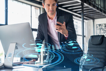 Businessman in suit using smart phone to optimize development by implying new technologies in...