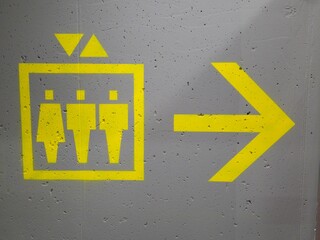 Elevator Sign in an Underground Parking Lot