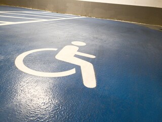 International Symbol of Access for Disabled People in an Underground Parking Lot