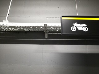 Motorcycle Parking Sign in an Underground Parking Lot
