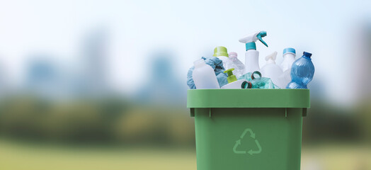 Waste bin full of plastic waste