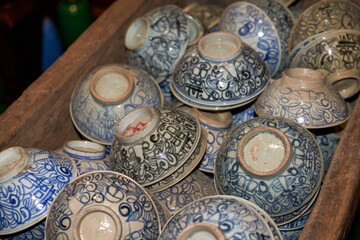 Pile of ceramic rice bowls and tea bowls close-up