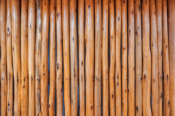 Brown old striped hardwood plank fence background